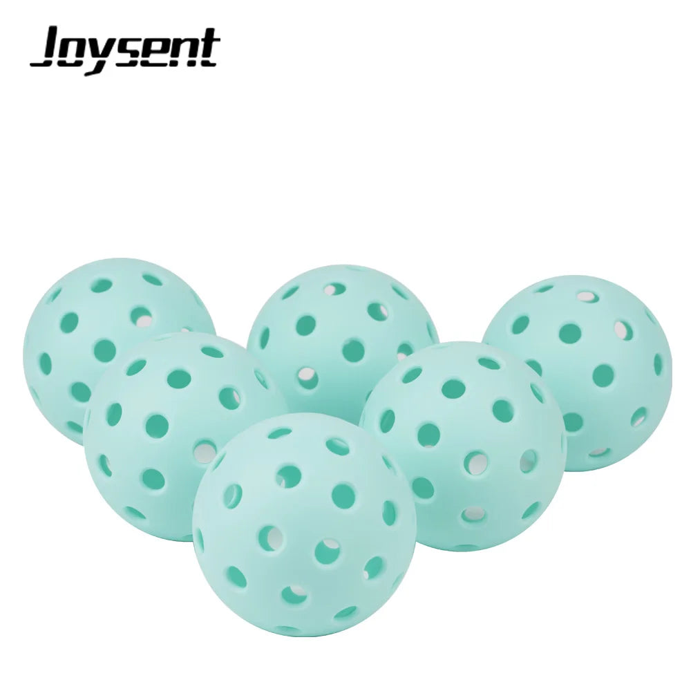 Light blue perforated balls with Joysent branding on a white background