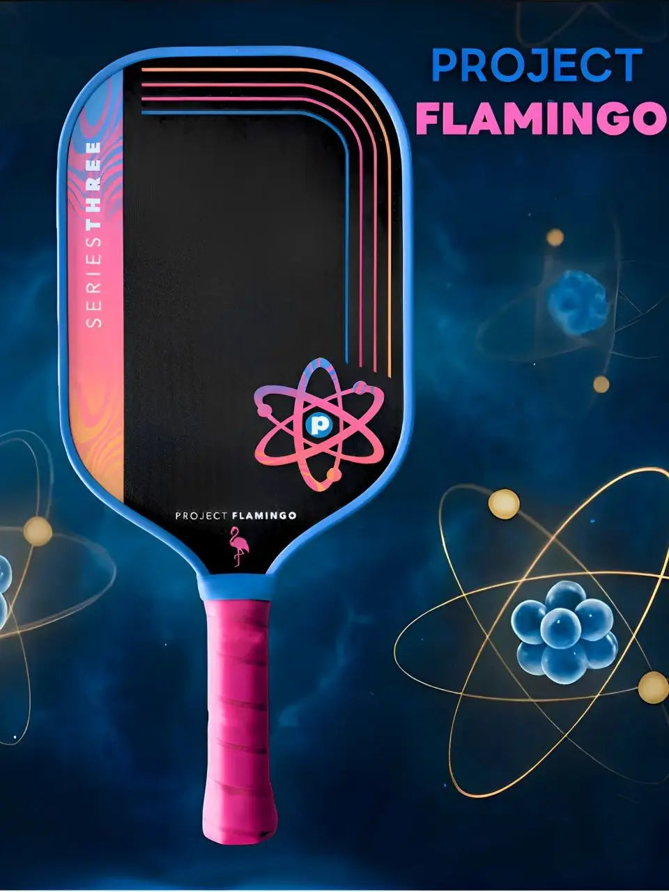 Pickleball paddle with pink handle and Project Flamingo branding on a blue atom-themed background