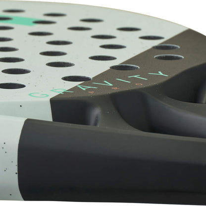 Close-up of a paddle with 'Cavity' branding on a white background