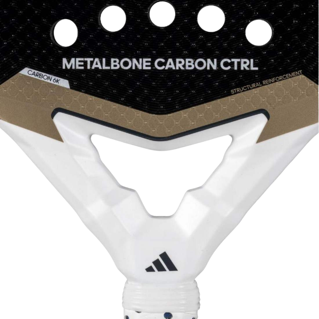 Close-up of a tennis racket with 'Metalbone Carbon Ctrl' branding on a white background
