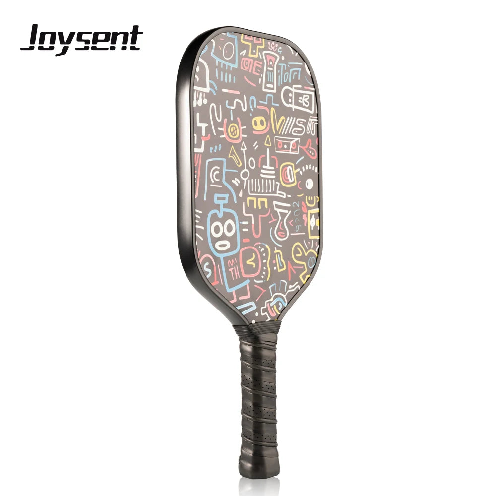 Colorful pickleball paddle with abstract design on a white background, featuring the brand 'Joysent'.