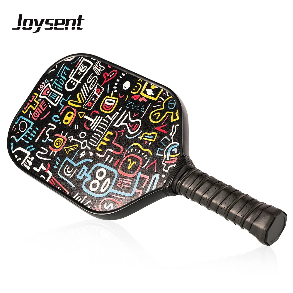 Colorful pickleball paddle with abstract design on a white background, featuring the brand 'Joysent'.