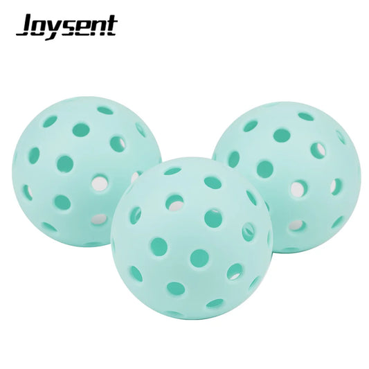 Three light blue perforated balls with Joysent branding on a white background