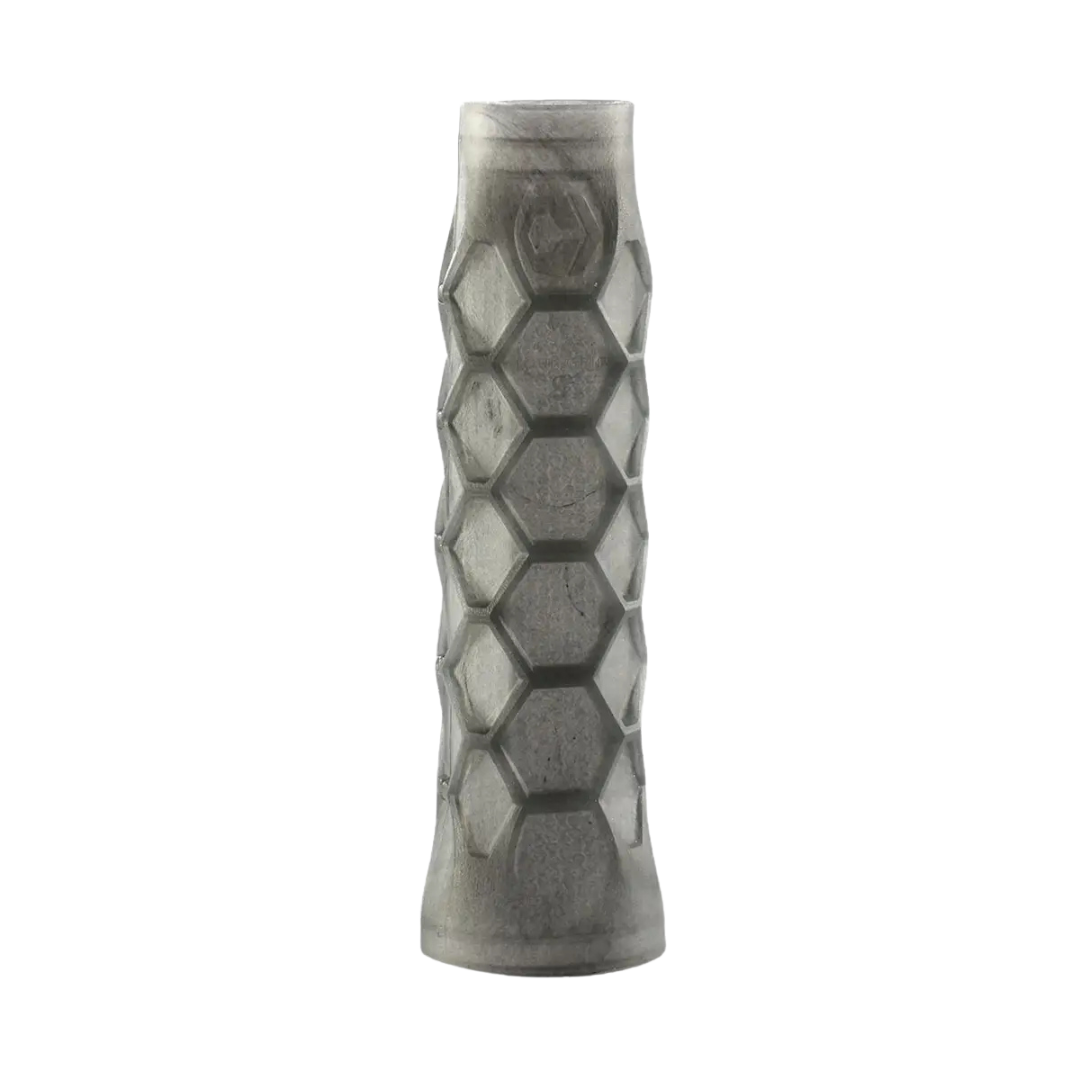 Hexagonal patterned cylindrical object on a white background