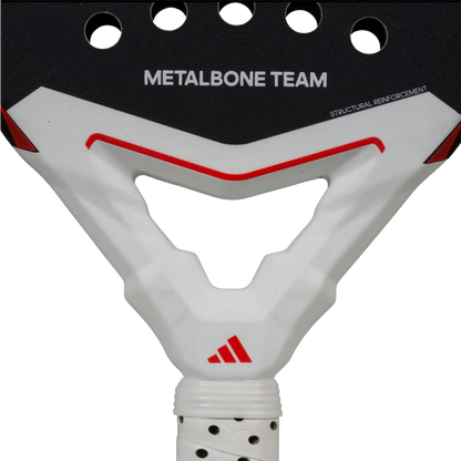 Close-up of a white and black metalbone team skateboard truck with red accents on a white background.