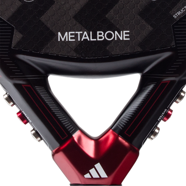 Close-up of a red and black sports equipment with 'Metalbone' branding.