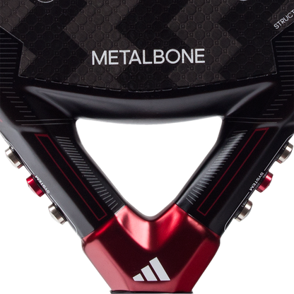 Close-up of a red and black sports equipment with 'Metalbone' branding.