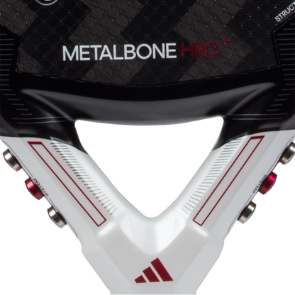 Close-up of a sports helmet with 'Metalbone HRD+' and Adidas branding.