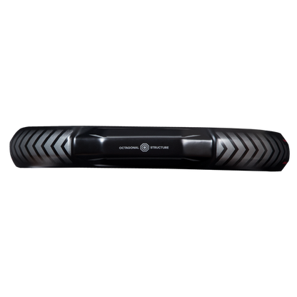 Black cylindrical object with textured surface on a white background