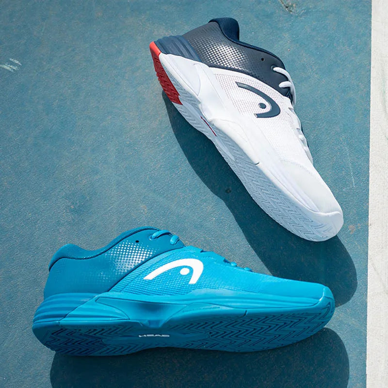 Blue and white sports shoes on a blue surface