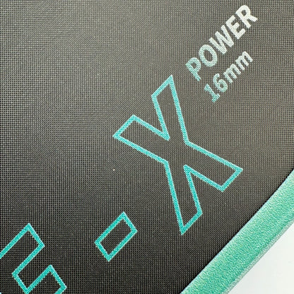 Close-up of a product with 'Power 16mm' and 'X' branding on a gray background.