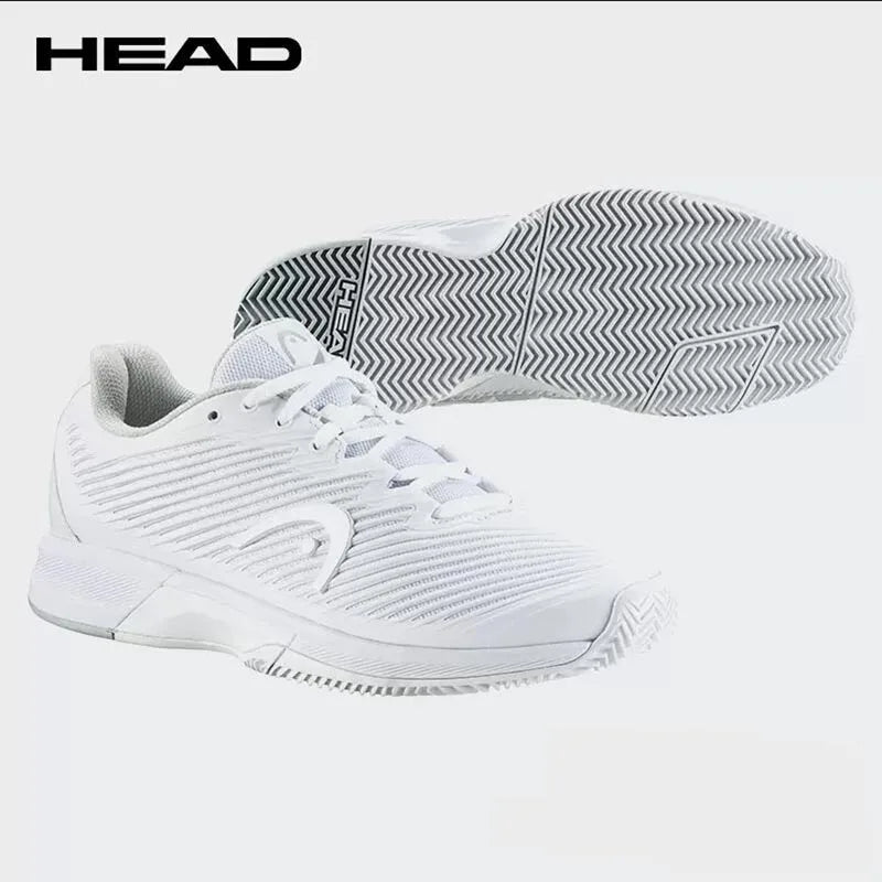 White athletic shoe with sole showing tread pattern on a light gray background, featuring the HEAD brand.