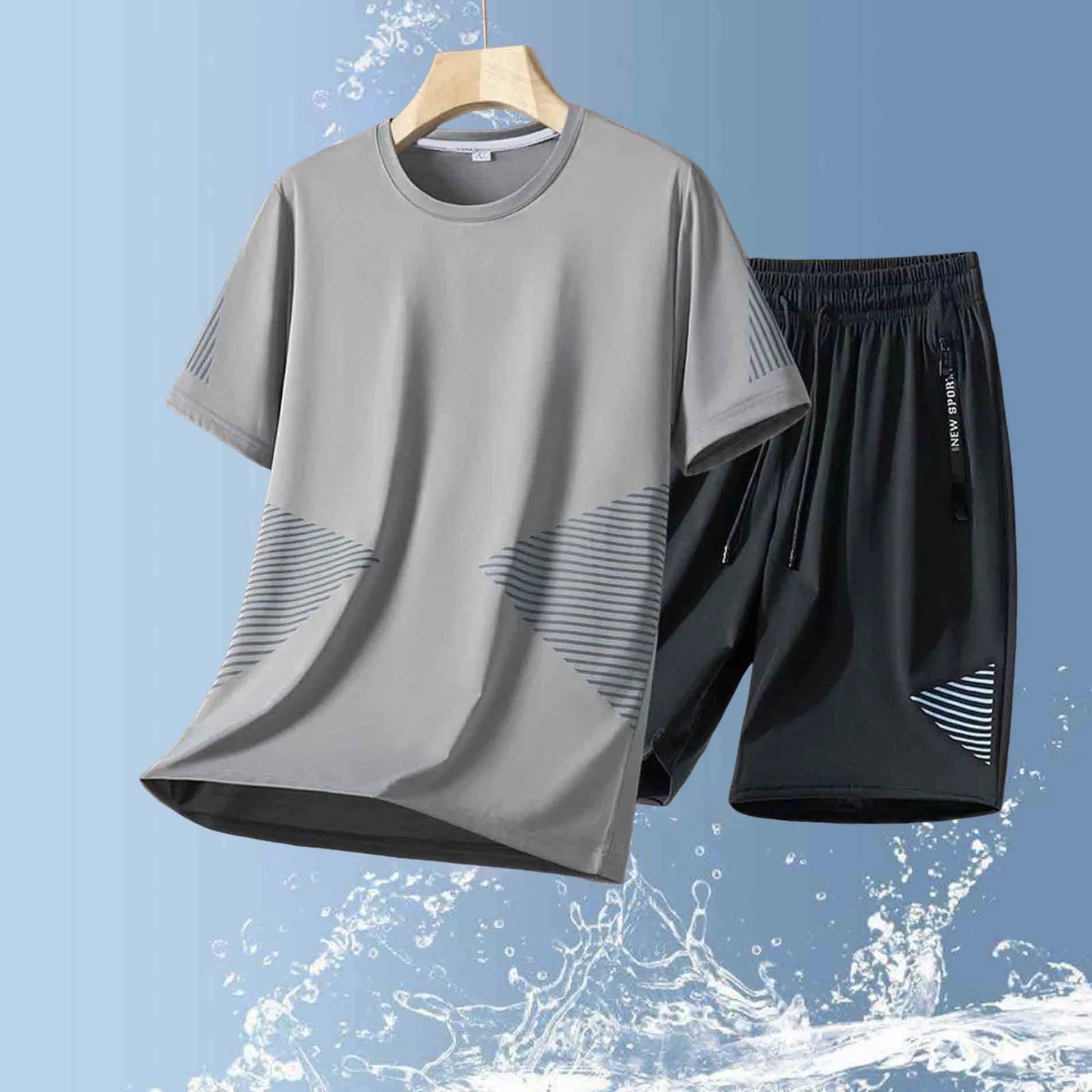 Gray t-shirt and black shorts set on a hanger with water splash background