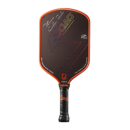 Pickleball paddle with orange and black design on a white background