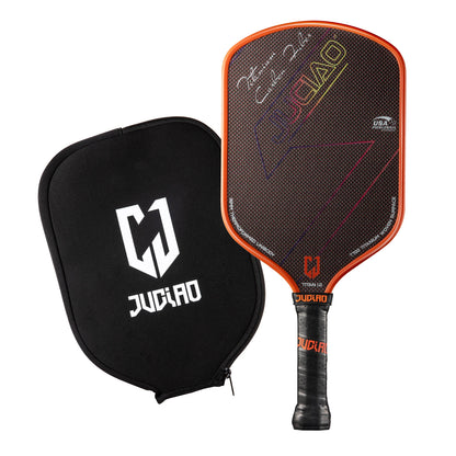 Orange pickleball paddle with black cover on a white background