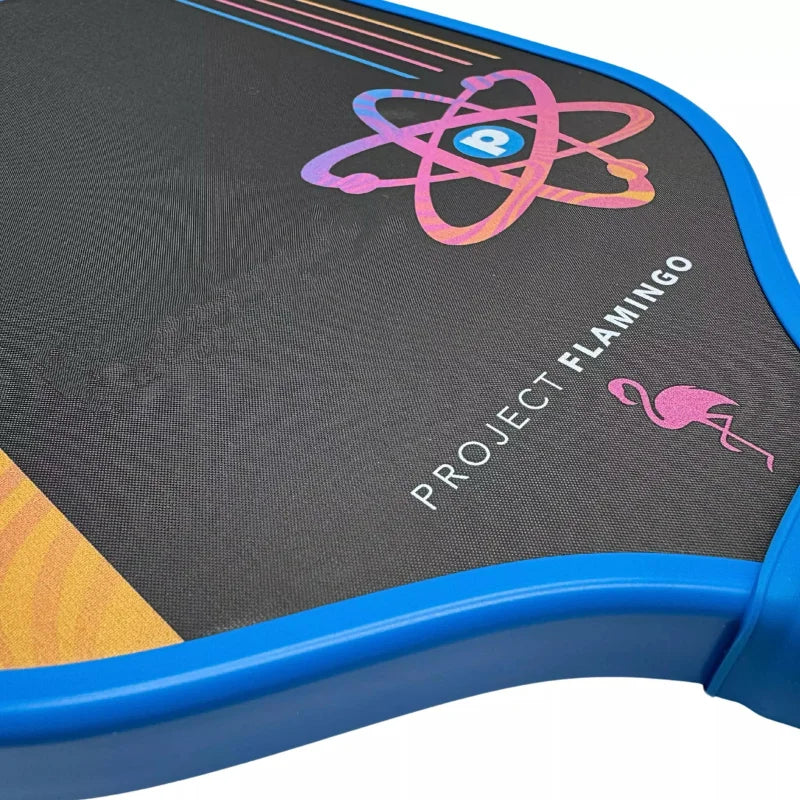 Close-up of a paddle with 'Project Flamingo' branding on a black background