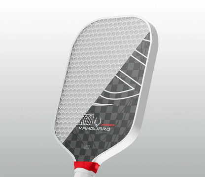 Pickleball paddle with honeycomb design on a gray background