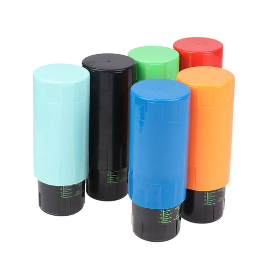 Set of six colorful cylindrical containers with black bases on a white background