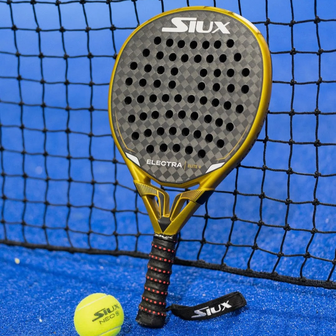 Siux Electra padel racket with a yellow ball on a blue court with net in the background