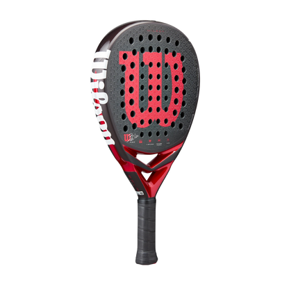 Red and black Wilson tennis racket on a white background