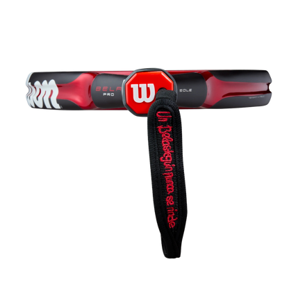 Red and black golf club with a strap on a white background