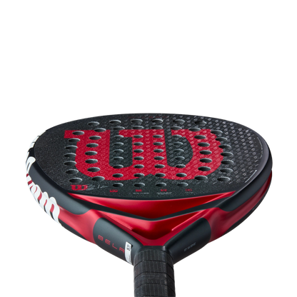 Red and black Wilson tennis racket on a white background