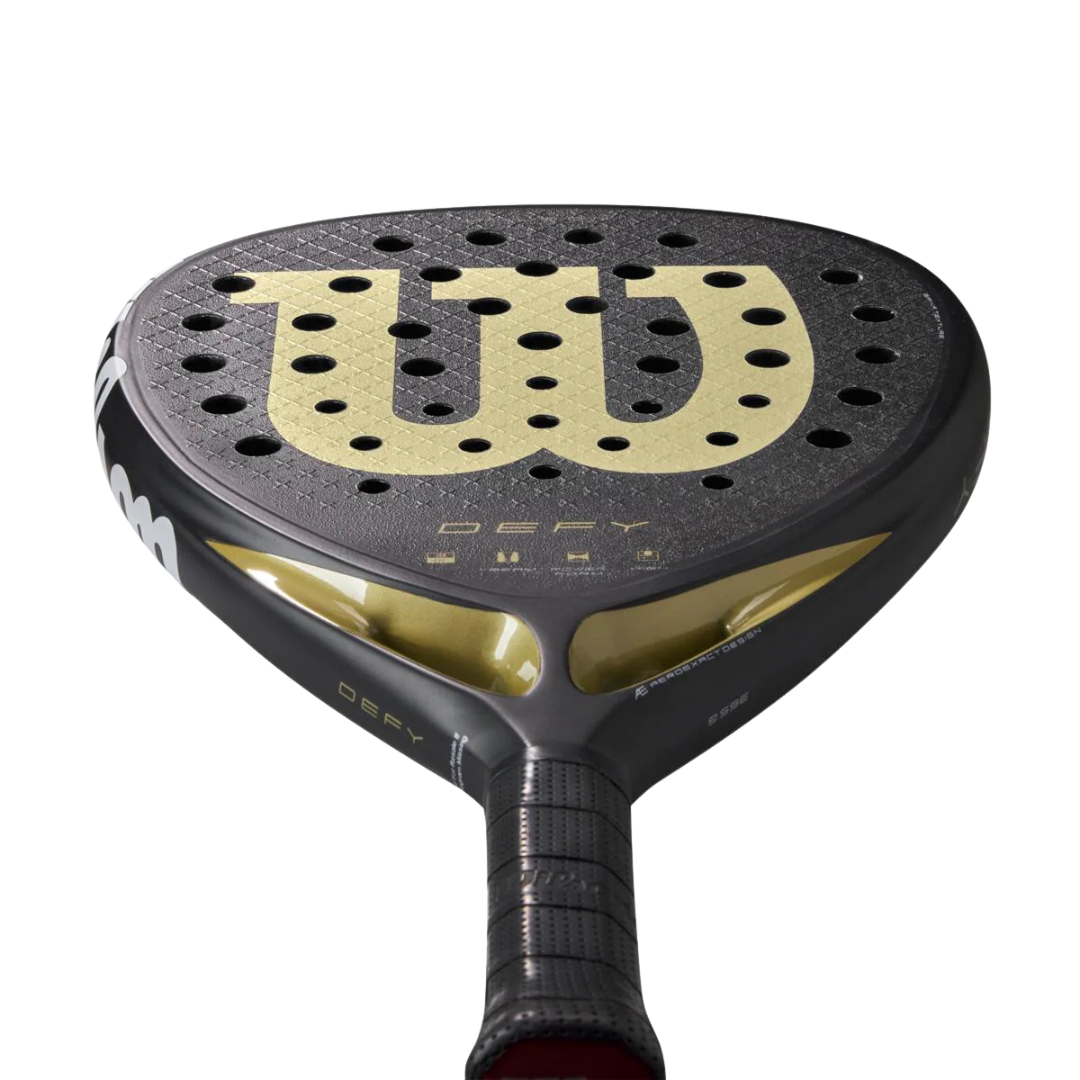 Black and gold tennis racket head with Wilson logo on a white background