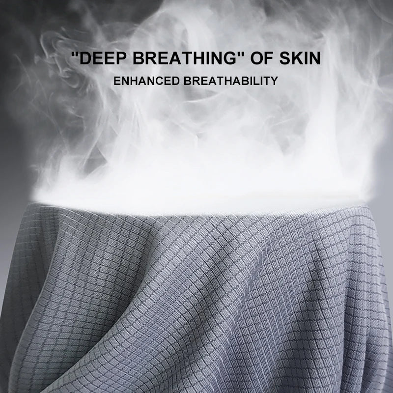 Text 'DEEP BREATHING OF SKIN' and 'ENHANCED BREATHABILITY' over a textured fabric with smoke effect.